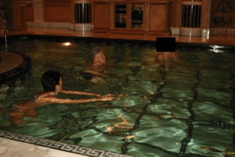 Bill Clinton swimming with Ghislaine Maxwell.
