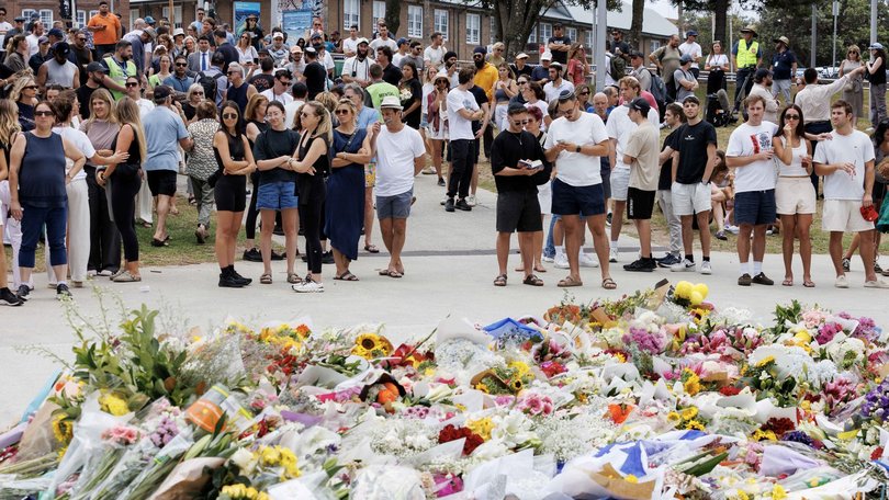 People leave flowers at the Bondi Beach pavilion on Monday. Picture: NewsWire / Nikki Short