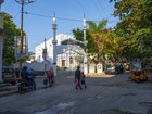 People walk on a street in Toli Chowki, an area of the southern Indian city of Hyderabad with many Muslim residents, Dec. 19, 2025. A neighborhood in India fears being blamed for a distant atrocity; the attacker killed at last week’s Hanukkah celebration in Australia came from a Muslim area whose residents have long gone abroad to seek better lives. (Saumya Khandelwal/The New York Times)