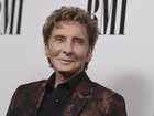 Veteran singer Barry Manilow has announced he is to undergo surgery for lung cancer. (AP PHOTO)