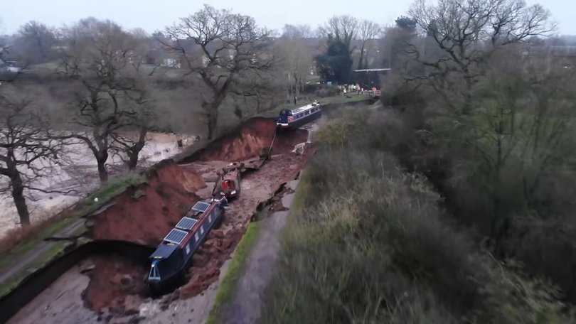 Three boats were impacted by a large sinkhole opening in England's West Midlands.