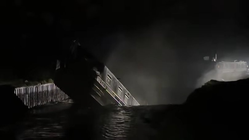 A boat teetering on the edge of the sinkhole in the Shropshire Union Canal.