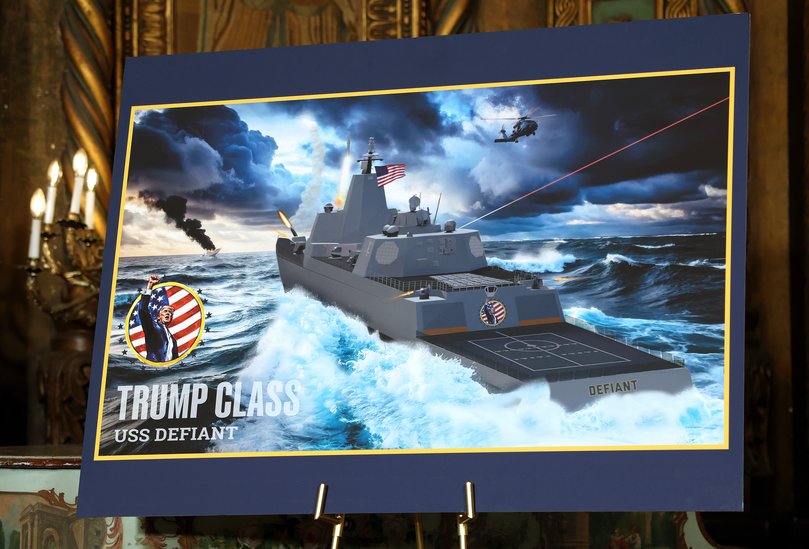 An artist rendering of the newly announced “Trump-class” battleship is displayed as President Donald Trump announces the new Naval ship class during a statement to the media at his Mar-a-Lago estate on December 22, 2025 in Palm Beach, Florida. Trump announced the new class of ship will become the centerpiece of his “Golden Fleet” program to rebuild and strengthen the U.S. shipbuilding industry. (Photo by Tasos Katopodis/Getty Images)