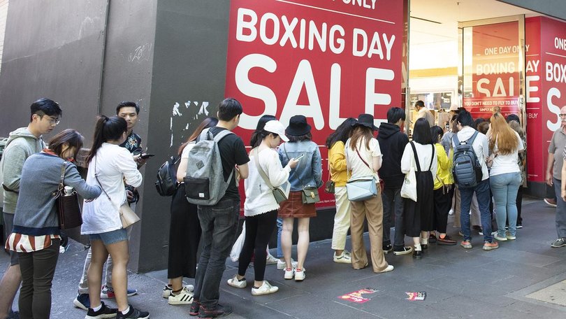 Shoppers are expected to swoop on bargains as Boxing Day sales coax budget-conscious buyers. (Ellen Smith/AAP PHOTOS)
