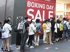 Shoppers are expected to swoop on bargains as Boxing Day sales coax budget-conscious buyers. (Ellen Smith/AAP PHOTOS)
