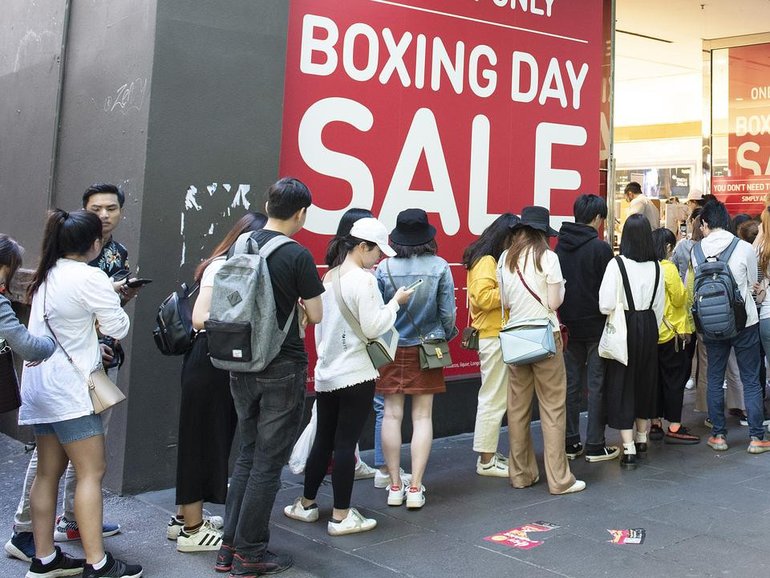 Shoppers are expected to swoop on bargains as Boxing Day sales coax budget-conscious buyers. (Ellen Smith/AAP PHOTOS)