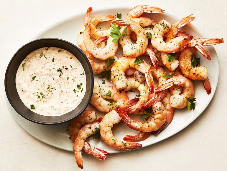 Roasted prawn cocktail with horseradish sauce. Do as Melissa Clark does, and roast, don’t poach, the prawns, then serve them with a creamy horseradish remoulade. Food styled by Cyd Raftus McDowell. 