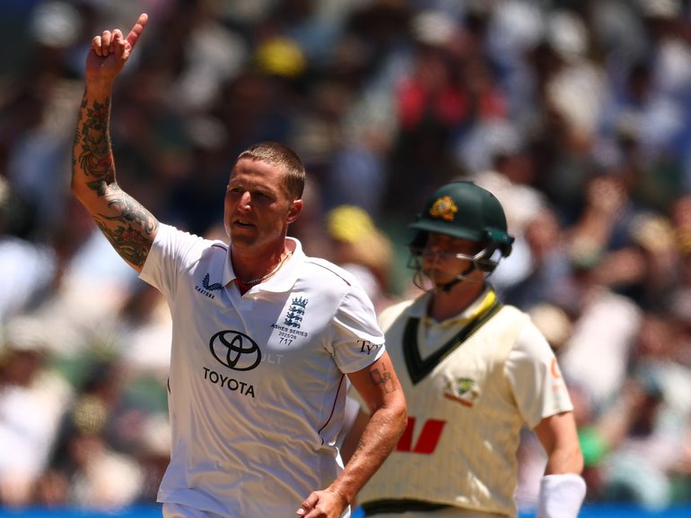 Brydon Carse celebrates the wicket of Travis Head.