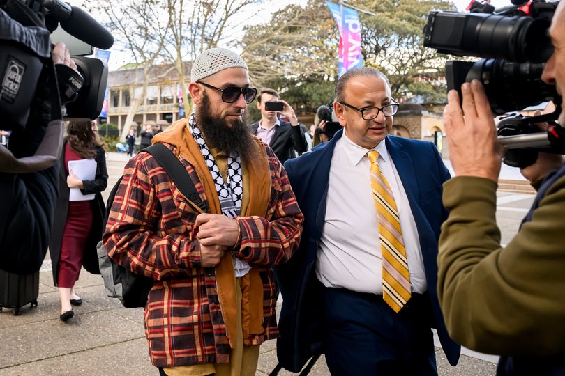 Muslim cleric, Wissam Haddad, also known as Abu Ousayd (left), departs the Federal Court of Australia in Sydney, Friday, June 13, 2025. Two leaders of the Executive Council of Australian Jewry have sued an Islamic preacher for racial discrimination over allegedly anti-Semitic sermons. (AAP Image/Bianca De Marchi) NO ARCHIVING