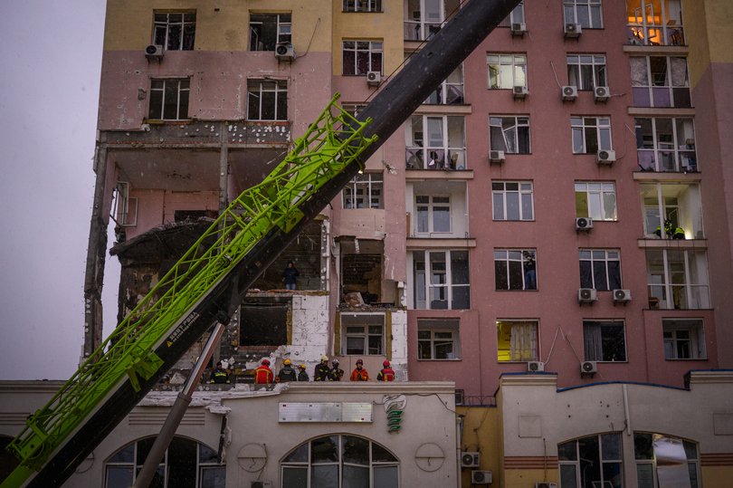 KYIV, UKRAINE - DECEMBER 27: A residential building was damaged during Russian air strikes which killed at two people and wounded dozens.