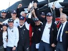 Comanche skippers James Mayo and Matt Allen and crew celebrate their Sydney-Hobart victory.  (Ethan James/AAP PHOTOS)