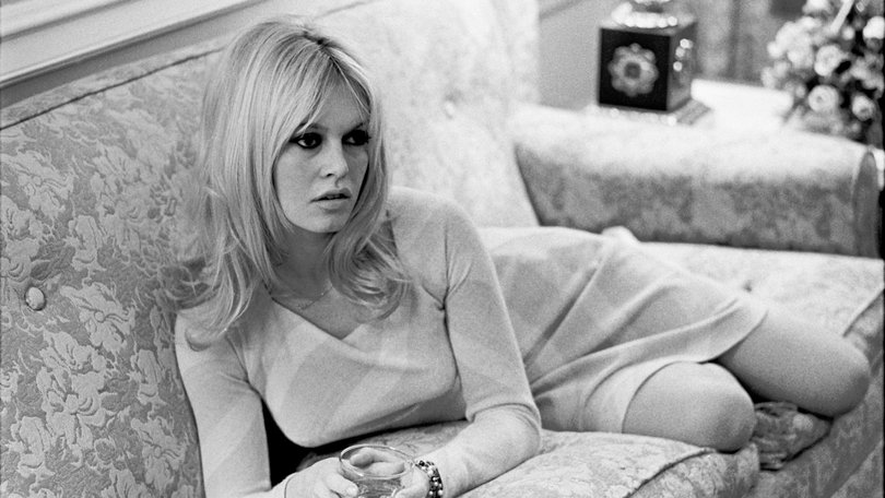 Brigitte Bardot relaxes in her hotel room at The Plaza Hotel in New York on Dec. 17, 1965. 