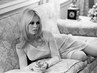 Brigitte Bardot relaxes in her hotel room at The Plaza Hotel in New York on Dec. 17, 1965. 