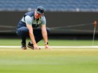 Andrew McDonald inspects the pitch ahead of the Boxing Day Test. 