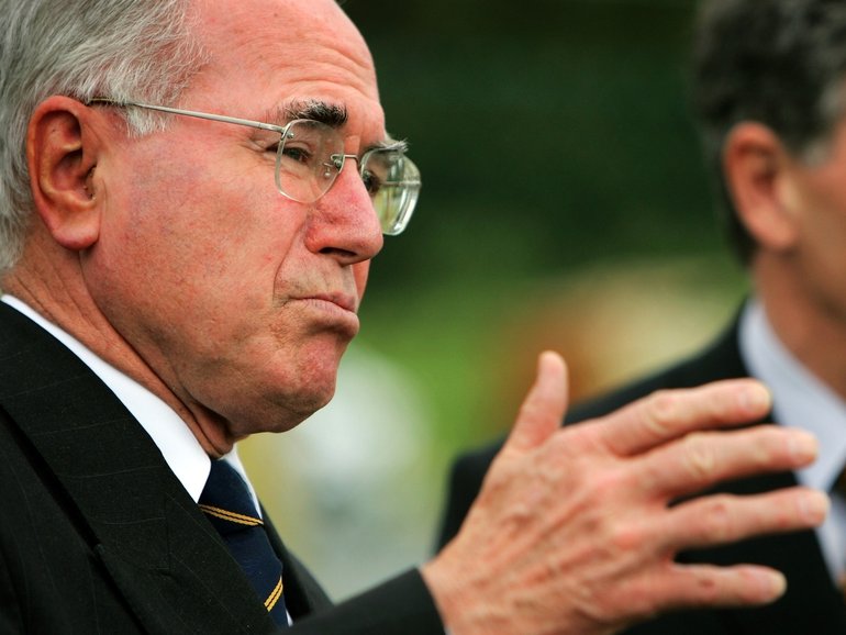 Prime Minister John Howard and Senator Robert Hill speak to the media at a press conference at Campbell Barracks, Perth, after seeing off a new contingent of S.A.S. troops to the Middle East.