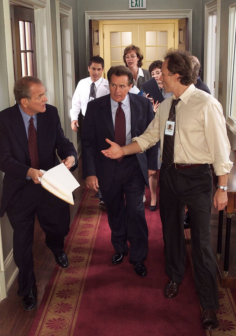 John Spencer as Leo McGarry, Rob Lowe as Sam Seaborn, Martin Sheen as President Josiah Bartlet, Allison Janney as C.J. Cregg, Moira Kelly as Madeline Hampton and Bradley Whitford as John Lyman.