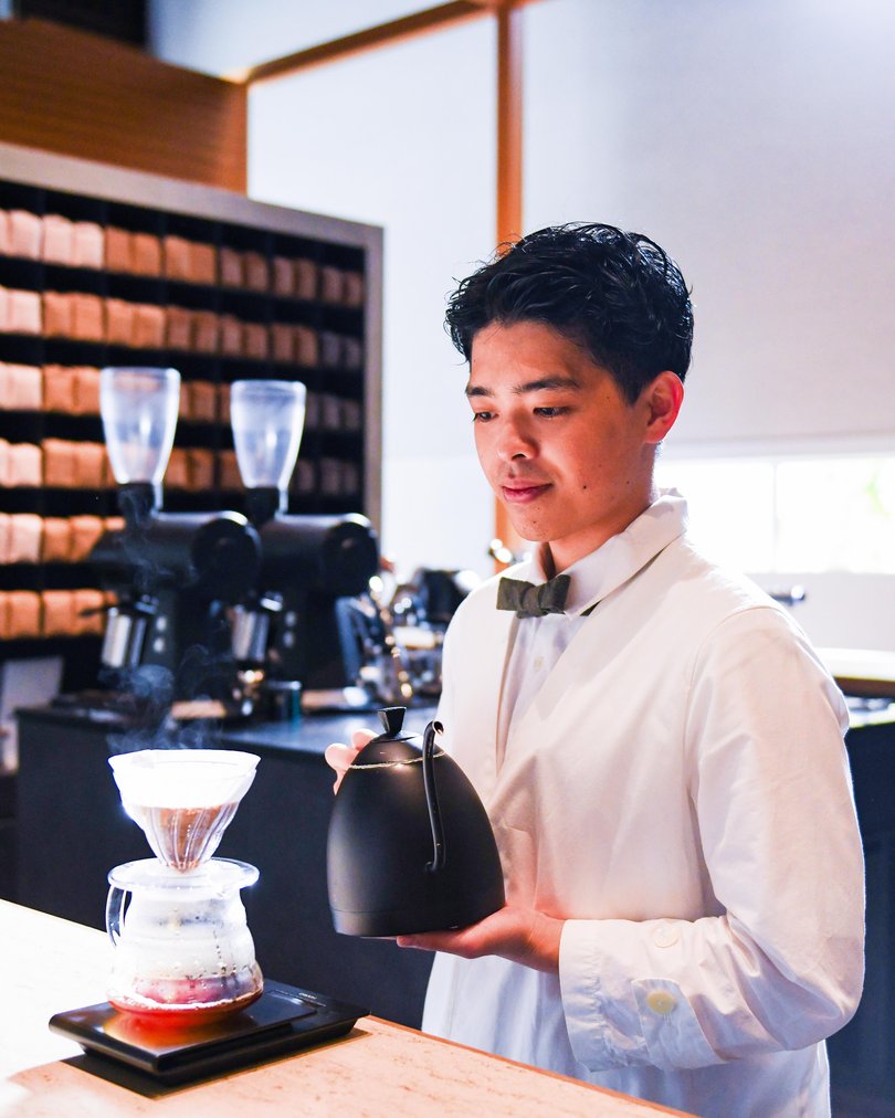 A barista brews coffee at Koffee Mameya Kakeru in Tokyo.