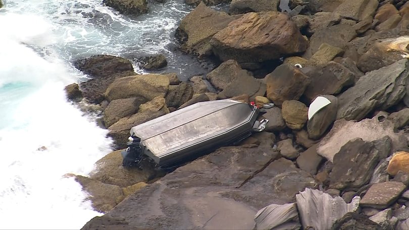 A search is underway for a teenager thrown from a boat that capsized in Sydney.