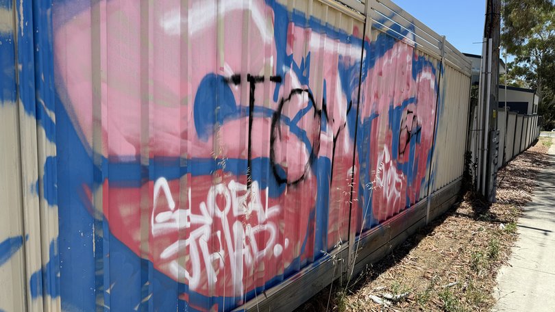 Graffiti reading "global jhiad" (JHIAD) was found in the south Canberra suburb of Chifley. 