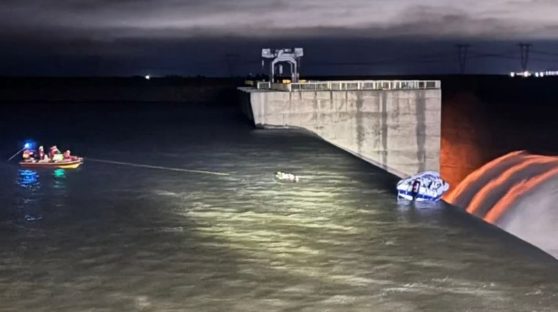 Rescuers pulled the men to safety using a throw line.