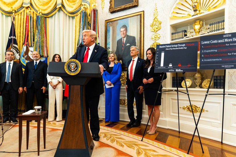 President Donald Trump answers questions in the Oval Office on Oct. 16 about plans to expand IVF access. 