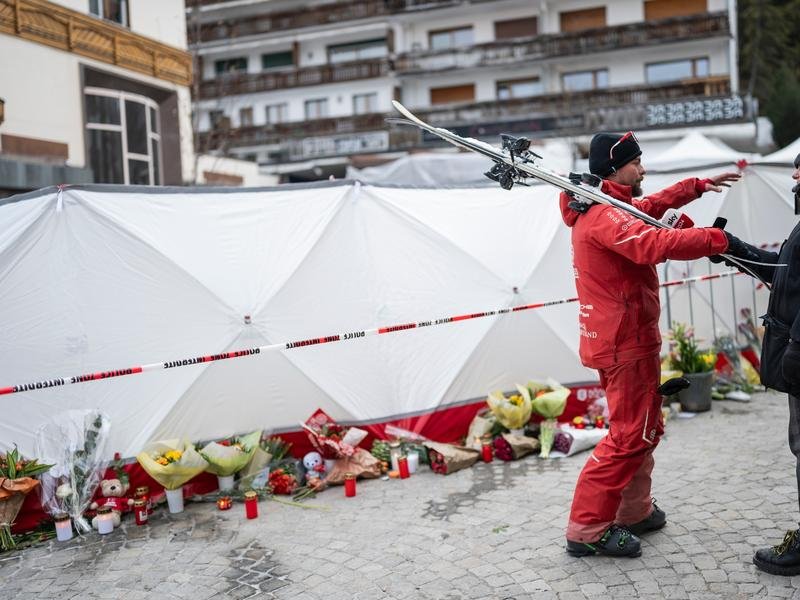 Visitors and residents of Swiss skiing resort Crans-Montana were stunned by the deadly inferno. (AP PHOTO)
