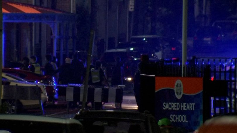 A crime scene has been established just metres from a local Catholic school in Fitzroy.