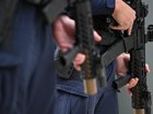 Police armed with rifles are among heightened security measures for the Ashes Test in Sydney. (James Ross/AAP PHOTOS)