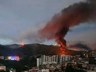 Fire at Fuerte Tiuna, Venezuela's largest military complex, is seen from a distance after a series of explosions in Caracas.