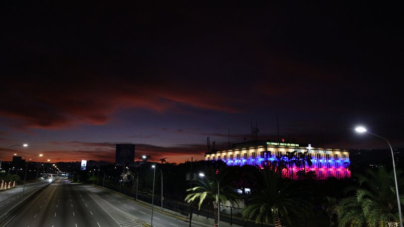 A highway in central Caracas is empty after explosions and low-flying aircraft were heard earlier in the day.