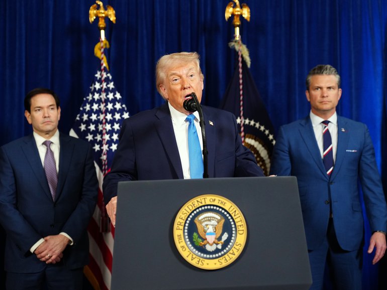 President Donald Trump is flanked by Secretary of State Marco Rubio left, and Defense Secretary Pete Hegseth as he speaks at Mar-a-Lago, his private club and residence in Palm Beach, Fla., on Saturday, Jan. 3, 2026. Trump said the United States would ÒrunÓ Venezuela until there can be a proper transition of power following the military operation that captured the countryÕs president, Nicols Maduro, and his wife. (Tierney L. Cross/The New York Times)