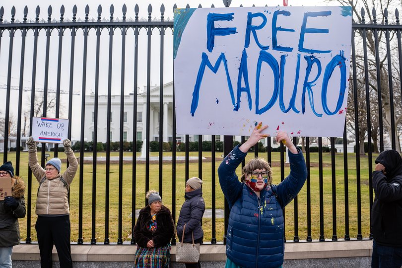 Demonstrators gather outside the White House  to protest the US military intervention in Venezuela.
