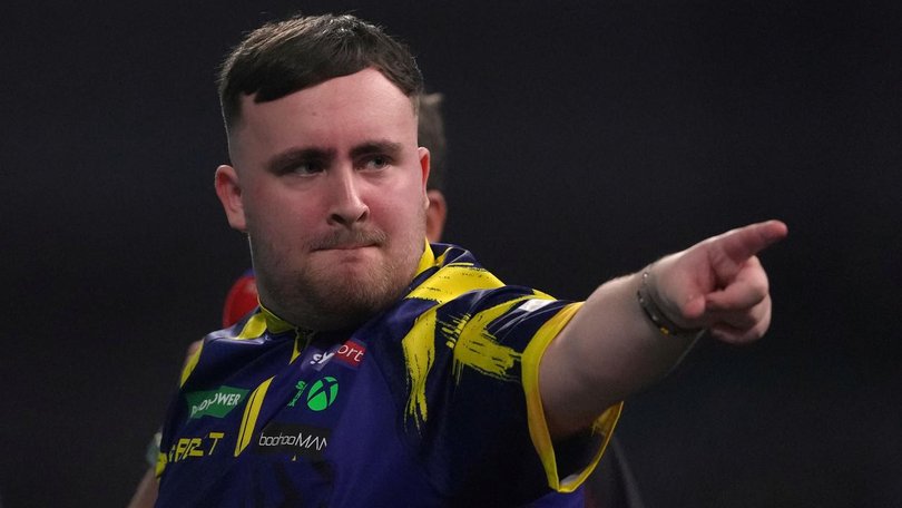 England's Luke Littler dominated to win his second world darts championship title. (AP PHOTO)