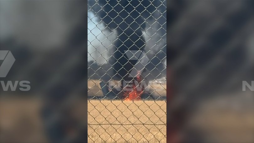 A pilot has escaped from a plane crash in Adelaide.