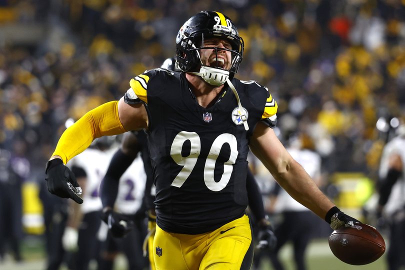 T.J. Watt #90 of the Pittsburgh Steelers reacts after intercepting a pass.