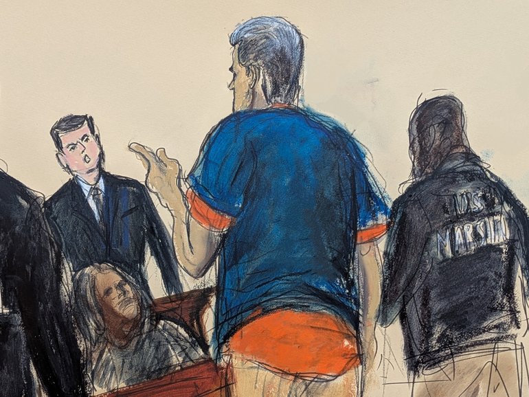 Venezuelan President NicolásMaduro reacts to a spectator after his arraignment. (Elizabeth Williams via AP)