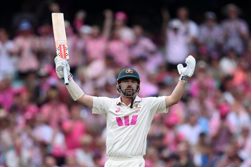 Travis Head of Australia celebrates reaching his century