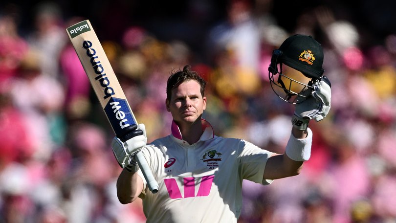 Australia captain Steve Smith celebrates reaching his century.
