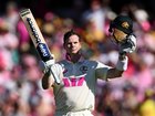 Australia captain Steve Smith celebrates reaching his century.