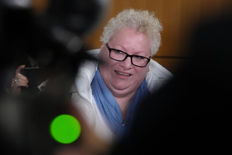 Defendant Delphine Jegousse known as Amandine Roy, answers reporters after a Paris court has found 10 people guilty of cyberbullying France's first lady, Brigitte Macron by spreading false online claims about her gender and sexuality, Monday, Jan. 5, 2026 in Paris. (AP Photo/Aurelien Morissard) Picture: Aurelien Morissard