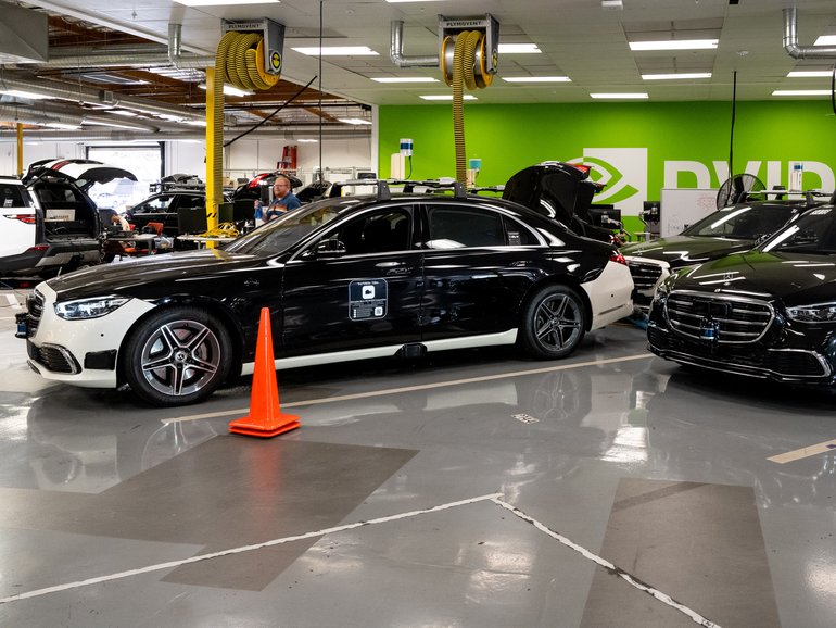 Nvidia test cars, part of the autonomous vehicle fleet, at the company's auto garage in California.