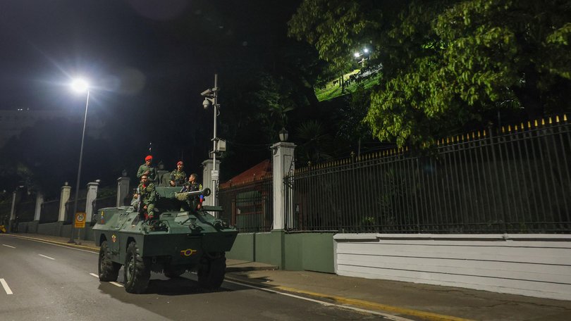 Military personnel guard the perimeter of the Miraflores Presidential Palace in Caracas, Venezuela on January 3. 
