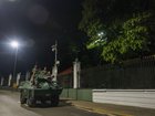 Military personnel guard the perimeter of the Miraflores Presidential Palace in Caracas, Venezuela on January 3. 