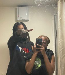 Bradshaw-McKoy and Bingham take selfies after brutally killing homeless man.