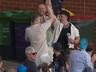 A BBL fan has taken a classic crowd catch while carrying two beer cans. 