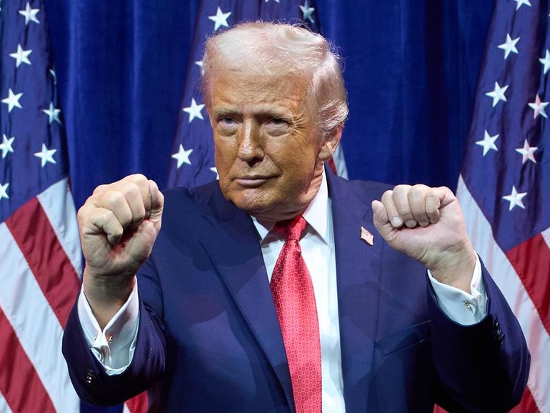 President Donald Trump has revealed first lady Melania does not like his "unpresidential" dancing. (AP PHOTO)