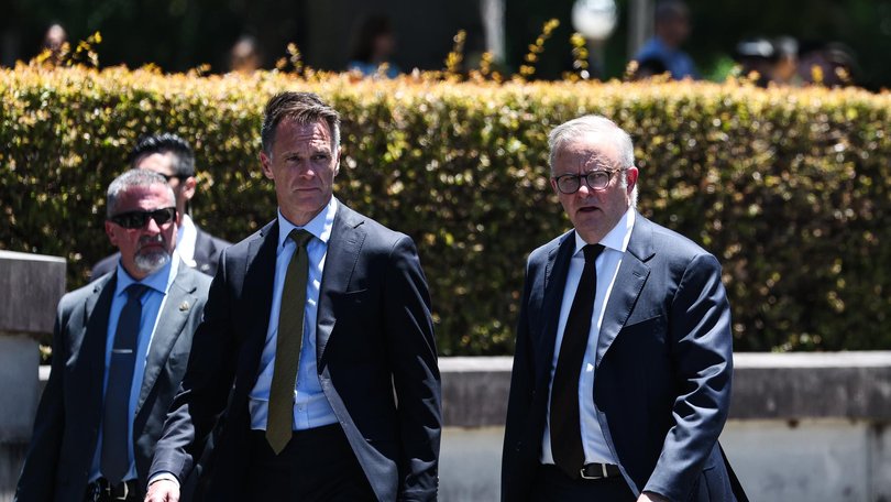 NSW Premier Chris Minns and Prime Minister Anthony Albanese AT the funeral for Peter Meagher at St Mary's Cathedral in Sydney. Photo: Gaye Gerard /NewsWire