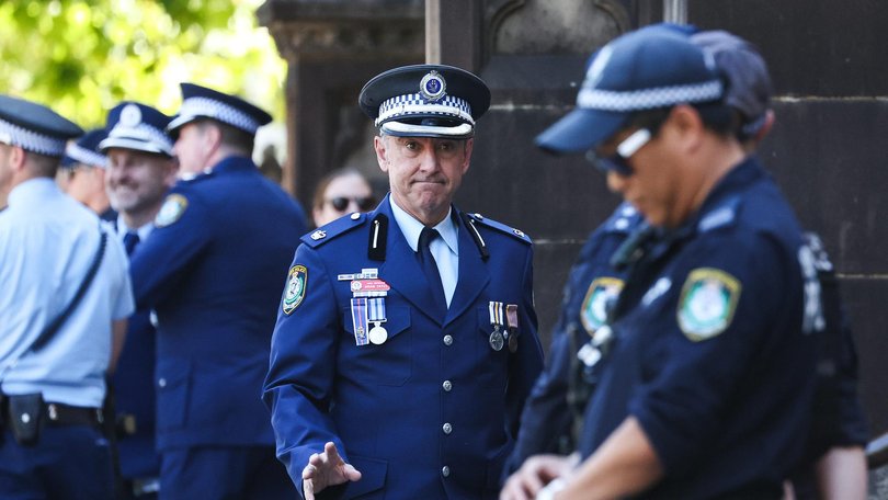 Many members of the police force gathered to pay respects. Photo: Gaye Gerard /NewsWire