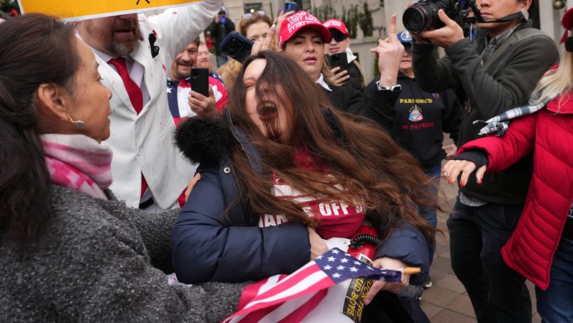 Supporters during a January 6 memorial march clash with protesters in Washington on Jan. 6, 2026, the fifth anniversary of the attack on the US Capitol. 