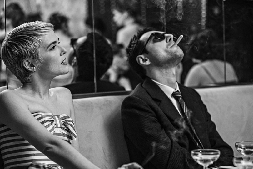 Zoey Deutch and Guillaume Marbeck as Jean Seberg and Jean-Luc Godard in Nouvelle Vague.